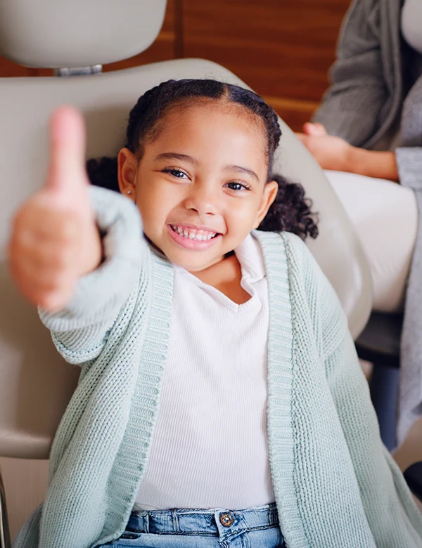Child Showing Thumb