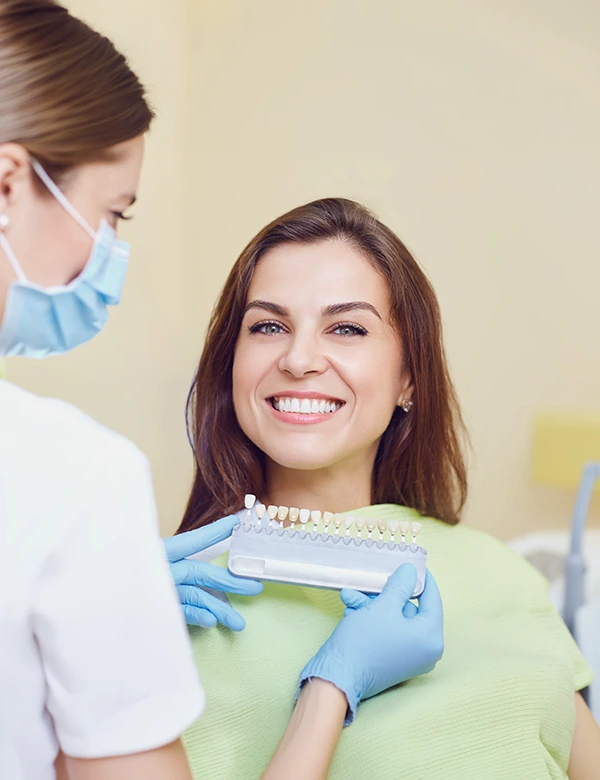 Dentist Checking The Matching Teeth