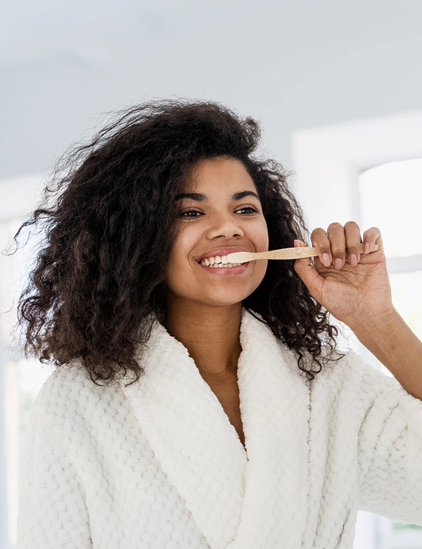 Woman Brushing Her Teeth